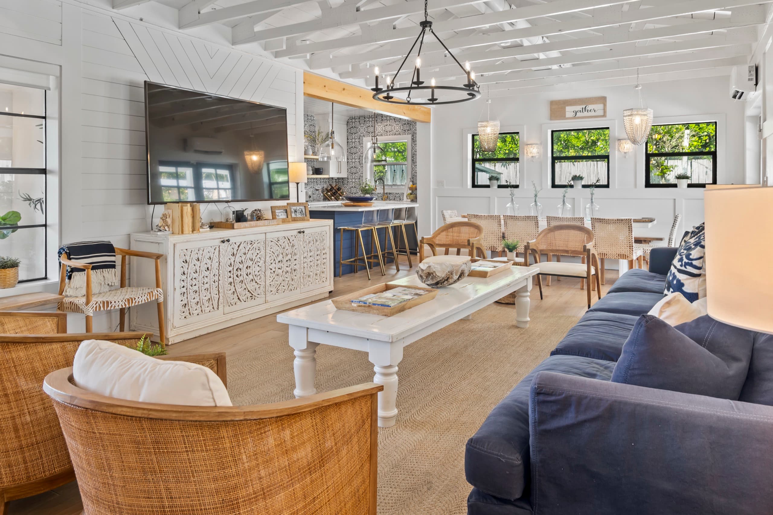 Spacious living room with large sofas and natural light