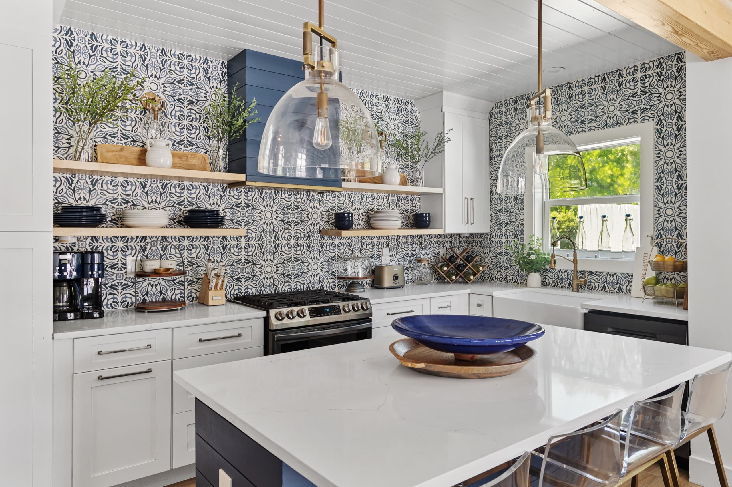 Open-concept chef's kitchen with island seating